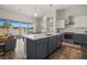 Bright, open kitchen boasts a large island, stainless steel appliances, and backyard views at 1357 Manassas Rdg Rdg, Mesquite, NV 89027