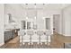 Bright kitchen featuring a center island with seating and stainless steel appliances at 1357 Manassas Rdg Rdg, Mesquite, NV 89027