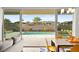Open floor plan featuring an easy transition from the living room to the outdoor pool and patio at 1357 Manassas Rdg Rdg, Mesquite, NV 89027