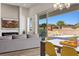 Bright living room featuring sliding glass doors that open to a private backyard with a swimming pool at 1357 Manassas Rdg Rdg, Mesquite, NV 89027