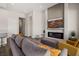 Comfortable living room with fireplace and seamless flow to other living spaces at 1357 Manassas Rdg Rdg, Mesquite, NV 89027