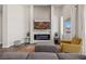Cozy living room featuring an elegant fireplace and access to the outdoor area at 1357 Manassas Rdg Rdg, Mesquite, NV 89027