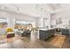 Open-concept living space featuring a modern kitchen, dining area, and comfortable seating with backyard pool access at 1357 Manassas Rdg Rdg, Mesquite, NV 89027
