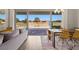 Cozy living room with views of the private backyard oasis featuring a sparkling pool and ample seating at 1357 Manassas Rdg Rdg, Mesquite, NV 89027