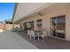 Spacious covered patio with a dining area offering stunning views of the sparkling pool and backyard at 1357 Manassas Rdg Rdg, Mesquite, NV 89027
