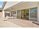 A large outdoor patio with easy access to the kitchen and living room via sliding glass doors at 1357 Manassas Rdg Rdg, Mesquite, NV 89027