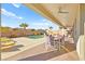 Inviting backyard featuring a sparkling pool, lounge chairs, and outdoor dining area at 1357 Manassas Rdg Rdg, Mesquite, NV 89027