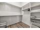 Organized walk-in closet with ample shelving and hanging space for storage at 1357 Manassas Rdg Rdg, Mesquite, NV 89027
