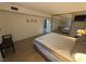 Spacious bedroom with mirrored closet, wood flooring, and queen bed at 1370 Vegas Valley Dr # 47, Las Vegas, NV 89169