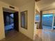 Bright entryway with tile flooring and a view of the courtyard and living area at 1370 Vegas Valley Dr # 47, Las Vegas, NV 89169