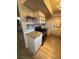 Modern kitchen featuring stainless steel appliances, granite countertops and sleek white cabinetry at 1370 Vegas Valley Dr # 47, Las Vegas, NV 89169