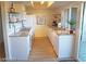 Bright kitchen featuring white cabinets, granite countertops, and modern appliances at 1370 Vegas Valley Dr # 47, Las Vegas, NV 89169