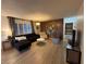 Inviting living room showcasing modern furnishings, wood-look flooring, and natural light at 1370 Vegas Valley Dr # 47, Las Vegas, NV 89169