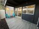 Relaxing patio with outdoor chairs and a view into the living area through sliding glass doors at 1370 Vegas Valley Dr # 47, Las Vegas, NV 89169