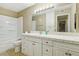 Well-lit bathroom featuring a vanity with drawers, ample countertop, and a shower-tub combination at 1405 Vegas Valley Dr # 257, Las Vegas, NV 89169