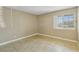 A bright, airy bedroom with neutral walls, large windows, and tile flooring, perfect for relaxation at 1405 Vegas Valley Dr # 257, Las Vegas, NV 89169