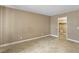 A cozy bedroom with neutral walls, tile flooring, and door to closet, providing a serene retreat at 1405 Vegas Valley Dr # 257, Las Vegas, NV 89169