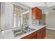 Well-lit kitchen featuring a stainless steel sink and ample counter space, enhanced by a window view at 1405 Vegas Valley Dr # 257, Las Vegas, NV 89169