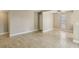 Bright living room with neutral walls and tile flooring, offering a versatile space for relaxation and entertainment at 1405 Vegas Valley Dr # 257, Las Vegas, NV 89169