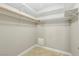 Organized walk-in closet featuring built-in shelving and ample storage space for clothing and accessories at 1405 Vegas Valley Dr # 257, Las Vegas, NV 89169