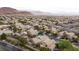 Scenic aerial view of a community nestled against a mountain backdrop, showcasing well-maintained homes at 19 Dryden Park Ave, Las Vegas, NV 89148