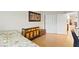 Light-filled bedroom features wood floors, a window and large closet for optimal storage at 19 Dryden Park Ave, Las Vegas, NV 89148