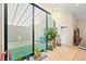 Bright sun room with a large sliding glass door leading to the backyard at 19 Dryden Park Ave, Las Vegas, NV 89148