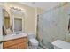 Clean bathroom featuring a vanity with ample counter space, a toilet, and a shower with curtain at 1991 High Mesa Dr, Henderson, NV 89012