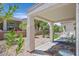 Relaxing covered patio with comfortable seating, ideal for outdoor entertaining and enjoying the desert landscape at 1991 High Mesa Dr, Henderson, NV 89012