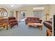 Comfortable living room with ample seating, natural light and sliding door access to patio at 1991 High Mesa Dr, Henderson, NV 89012