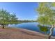 Scenic community pond with a fountain and lush landscaping, providing a tranquil setting at 1991 High Mesa Dr, Henderson, NV 89012