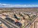 Expansive aerial shot of a residential area with colorful buildings and well-planned streets at 20 E Serene Ave # 111, Las Vegas, NV 89123