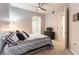 Well-lit bedroom with an ensuite bathroom and closet access, perfect for relaxation and privacy at 20 E Serene Ave # 111, Las Vegas, NV 89123