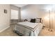 Comfortable bedroom featuring neutral colors and plush bedding for a peaceful retreat at 20 E Serene Ave # 111, Las Vegas, NV 89123
