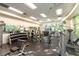 Well-equipped gym with weight machines, free weights, and natural light, offering a comprehensive fitness experience at 20 E Serene Ave # 111, Las Vegas, NV 89123