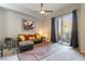 Inviting living room featuring modern decor and access to a private balcony with great natural light at 20 E Serene Ave # 111, Las Vegas, NV 89123