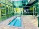 Community pool with a clean and clear pool and a modern design with lots of light and glass at 20 E Serene Ave # 111, Las Vegas, NV 89123