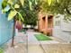 Walking path between residential buildings, featuring turf yard at 20 E Serene Ave # 111, Las Vegas, NV 89123