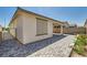 Paver patio in backyard, showing side yard and privacy wall at 2110 Albury Ave, North Las Vegas, NV 89086