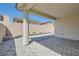 Spacious backyard patio with pavers and a concrete privacy wall at 2110 Albury Ave, North Las Vegas, NV 89086