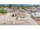 This is an aerial view of the property showing the home, the desert landscaping, and the neighborhood at 2200 Stanley Ave, North Las Vegas, NV 89030
