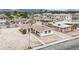 This is an aerial view of the property showing the home, the desert landscaping, and the neighborhood at 2200 Stanley Ave, North Las Vegas, NV 89030