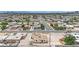 This is an aerial shot of the neighborhood showing other houses, streets, sidewalks, and landscaping at 2200 Stanley Ave, North Las Vegas, NV 89030