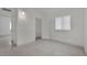 A bedroom with gray floors, closet and neutral colored walls at 2200 Stanley Ave, North Las Vegas, NV 89030