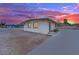This is a single-story home featuring a functional design, desert landscape, and nearby community features at 2200 Stanley Ave, North Las Vegas, NV 89030