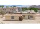 This is a house on a street with other houses and landscaping at 2200 Stanley Ave, North Las Vegas, NV 89030