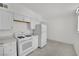 An open kitchen shows an oven, refrigerator and countertops at 2200 Stanley Ave, North Las Vegas, NV 89030