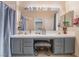 Elegant bathroom with double sinks, generous counter space, and stylish cabinetry at 2325 Windmill Pkwy # 323, Henderson, NV 89074