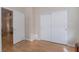 Hallway with wood floors leads to the living spaces, connecting the home seamlessly at 2325 Windmill Pkwy # 323, Henderson, NV 89074