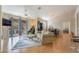 Inviting living room features a balcony, and comfortable seating, perfect for relaxation and entertaining at 2325 Windmill Pkwy # 323, Henderson, NV 89074